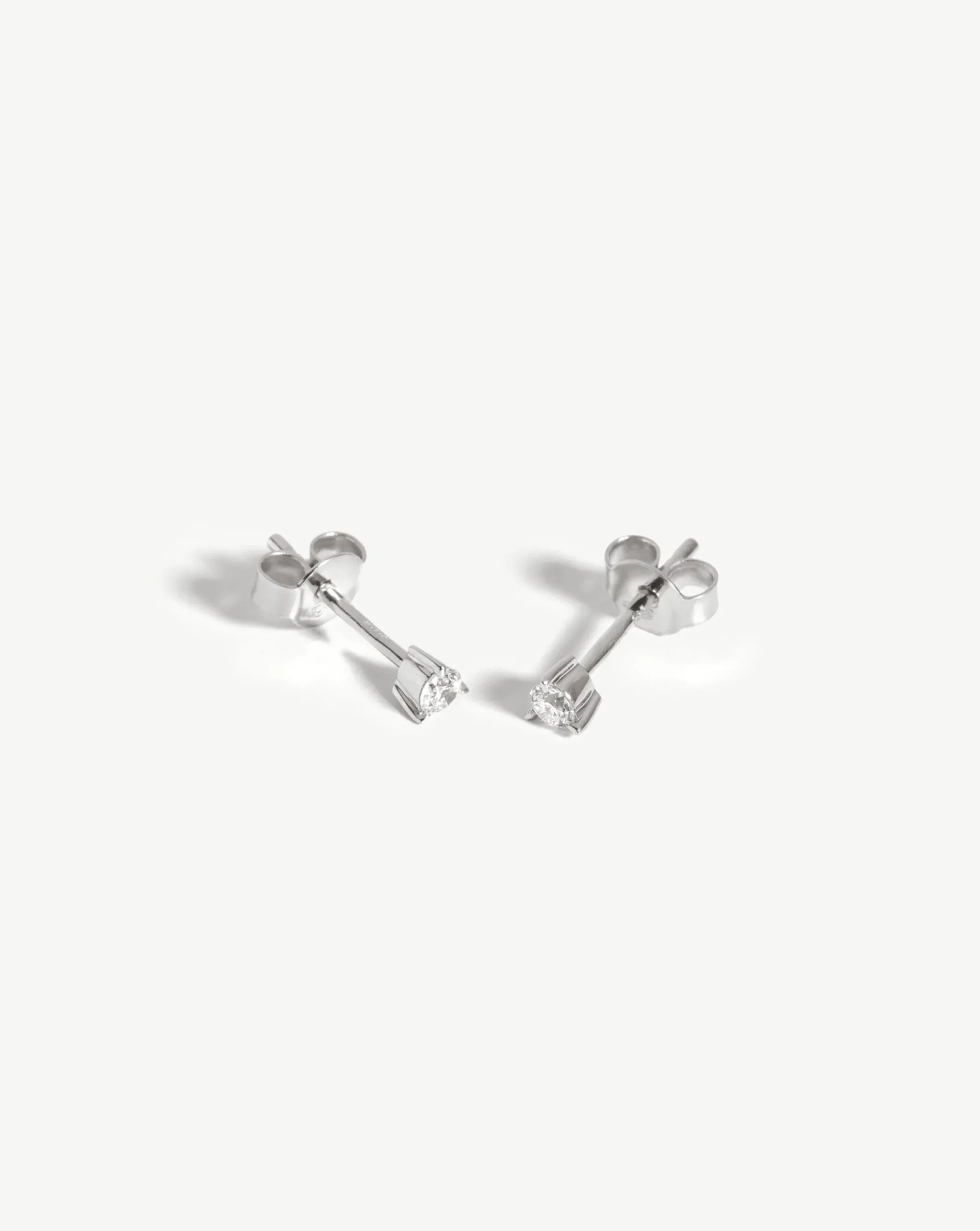 Fine Small Solitaire Diamond Stud Earrings
